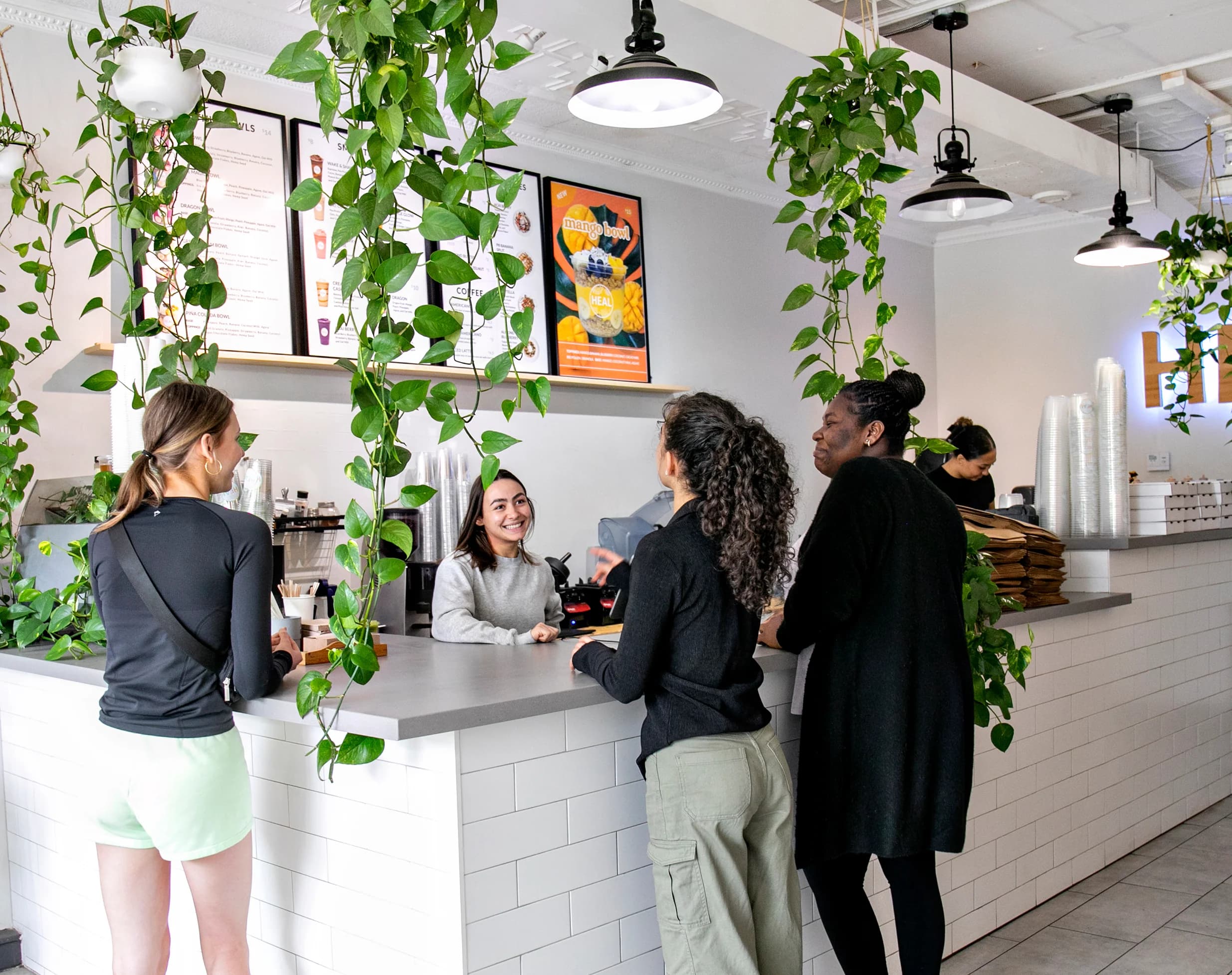 Guests ordering at the HEAL Wellness counter