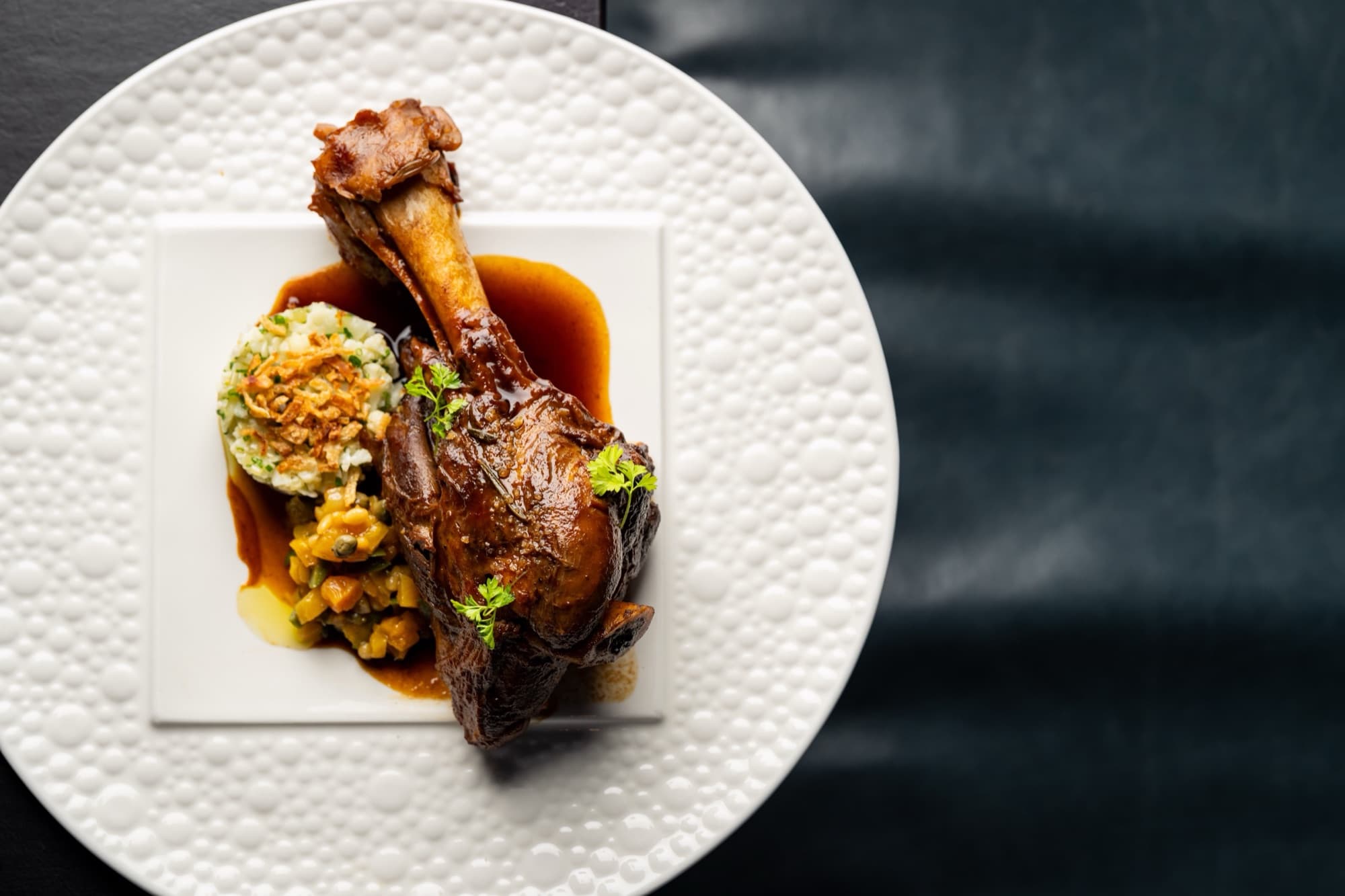 A plated main course at Restaurant Lucie