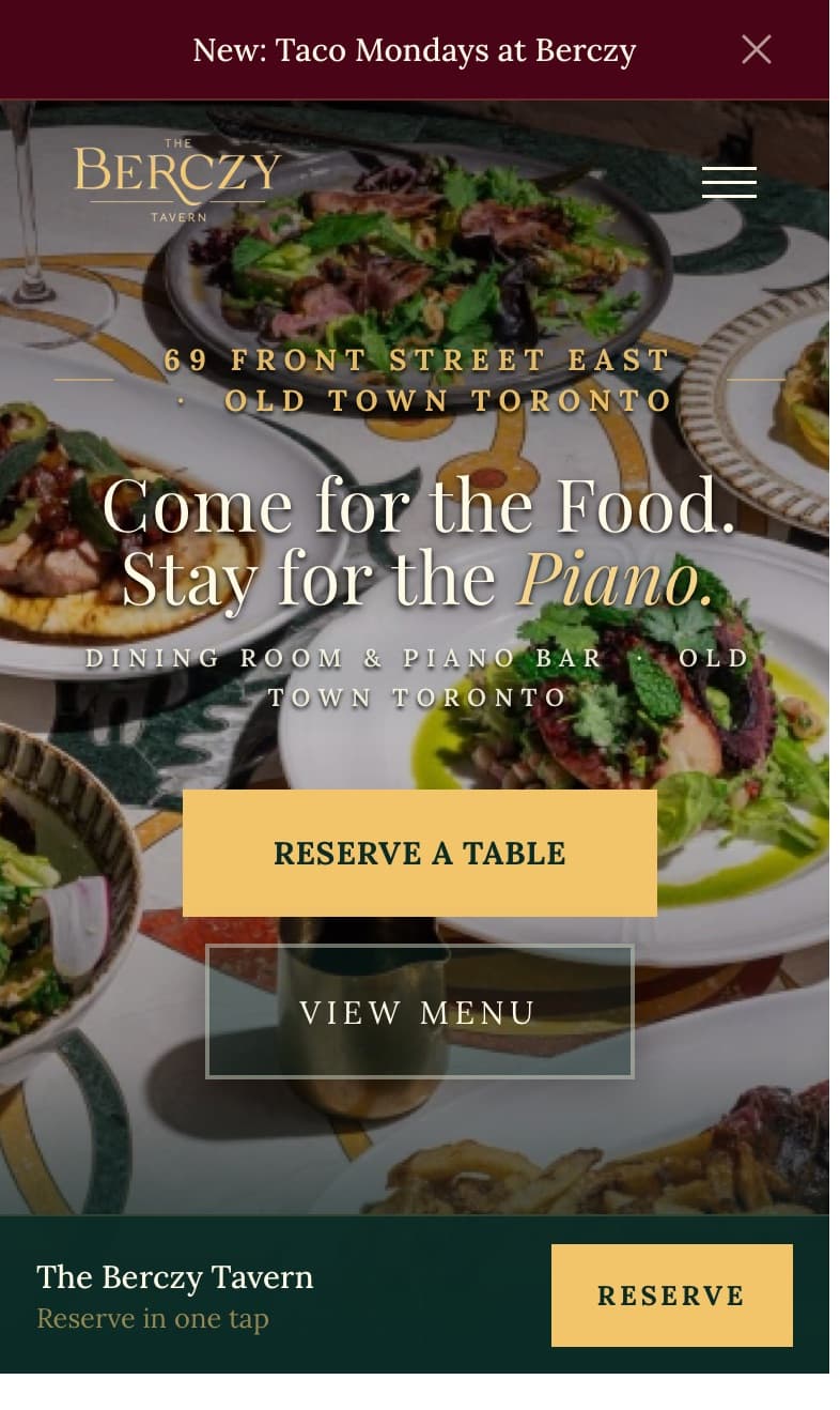 The Berczy Tavern website on a phone